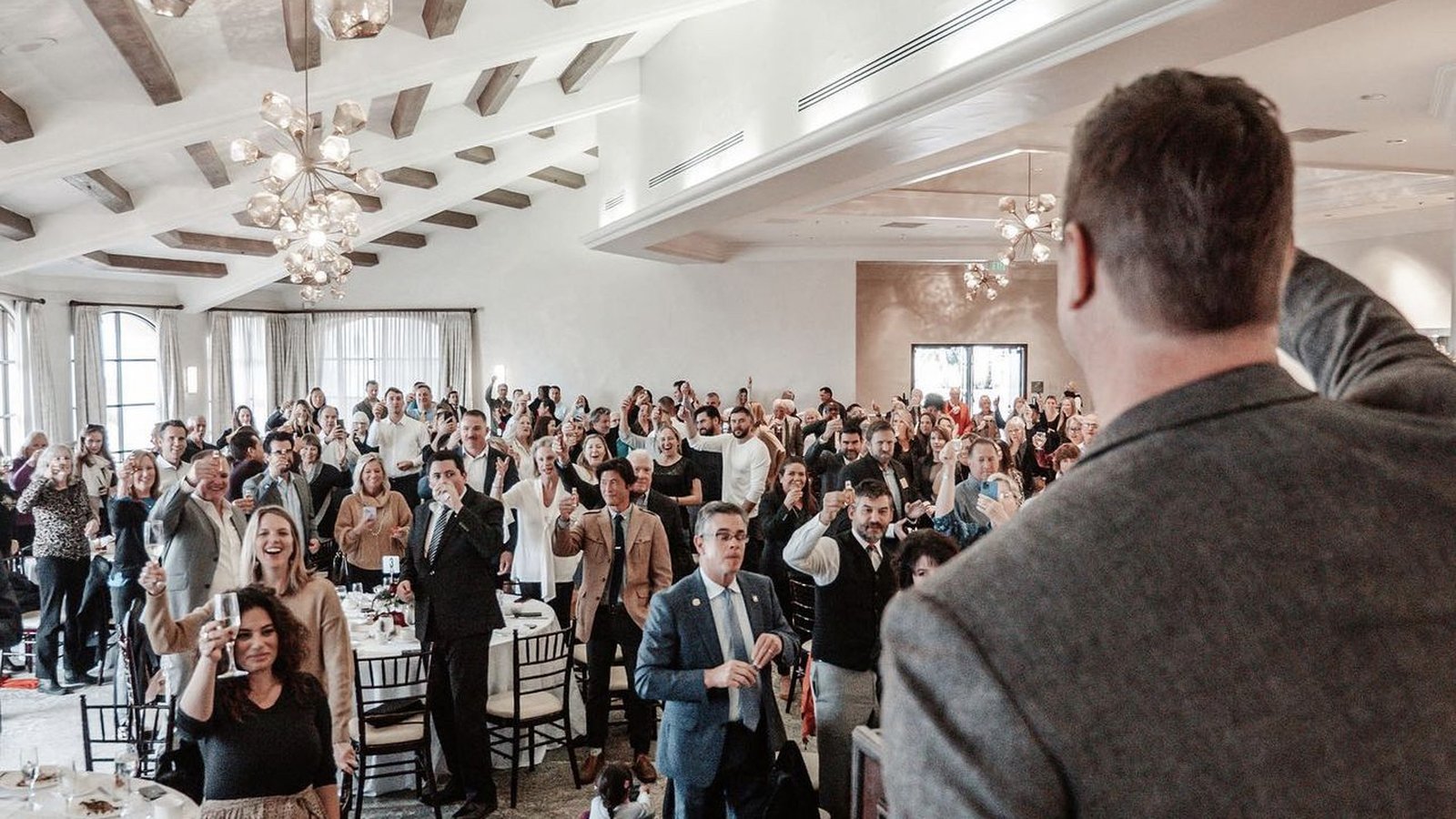 The Santa Barbara Association of Realtors membership raising a toast to Todd Shea at his installation as 2023 President