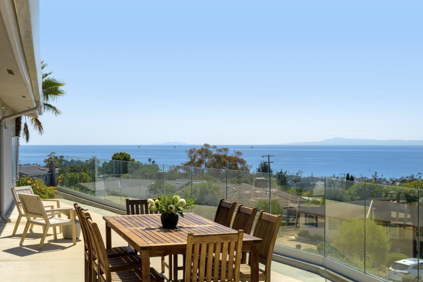 74 Chase Drive terrace with glass railing and ocean view